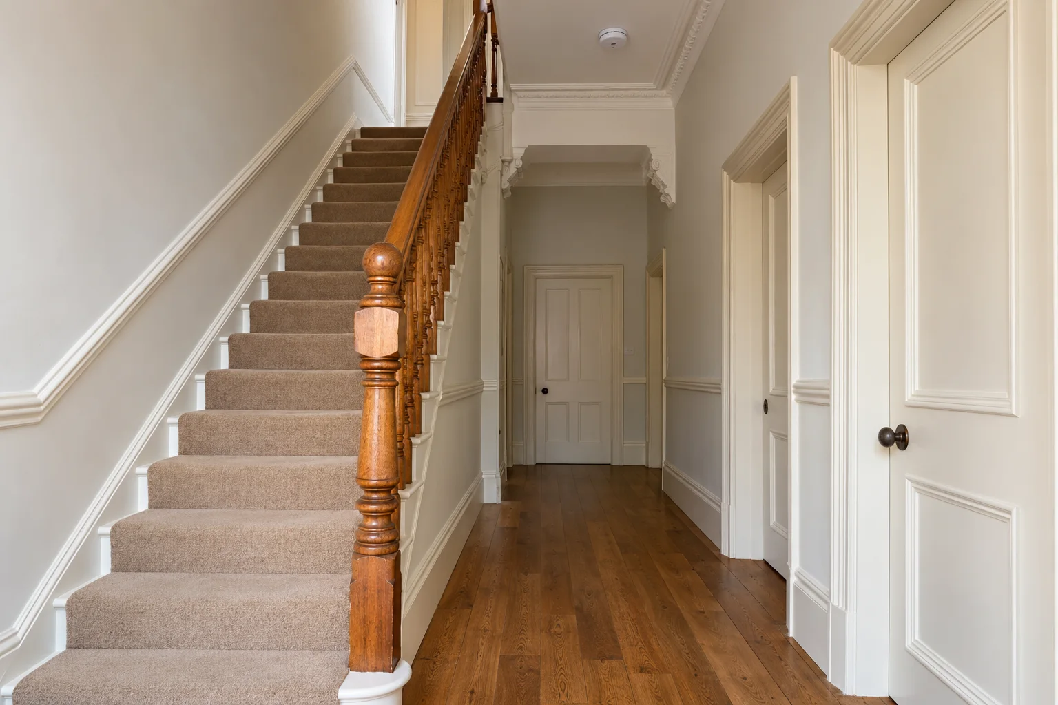 Illustrative clear shared entrance hall in a British residential property